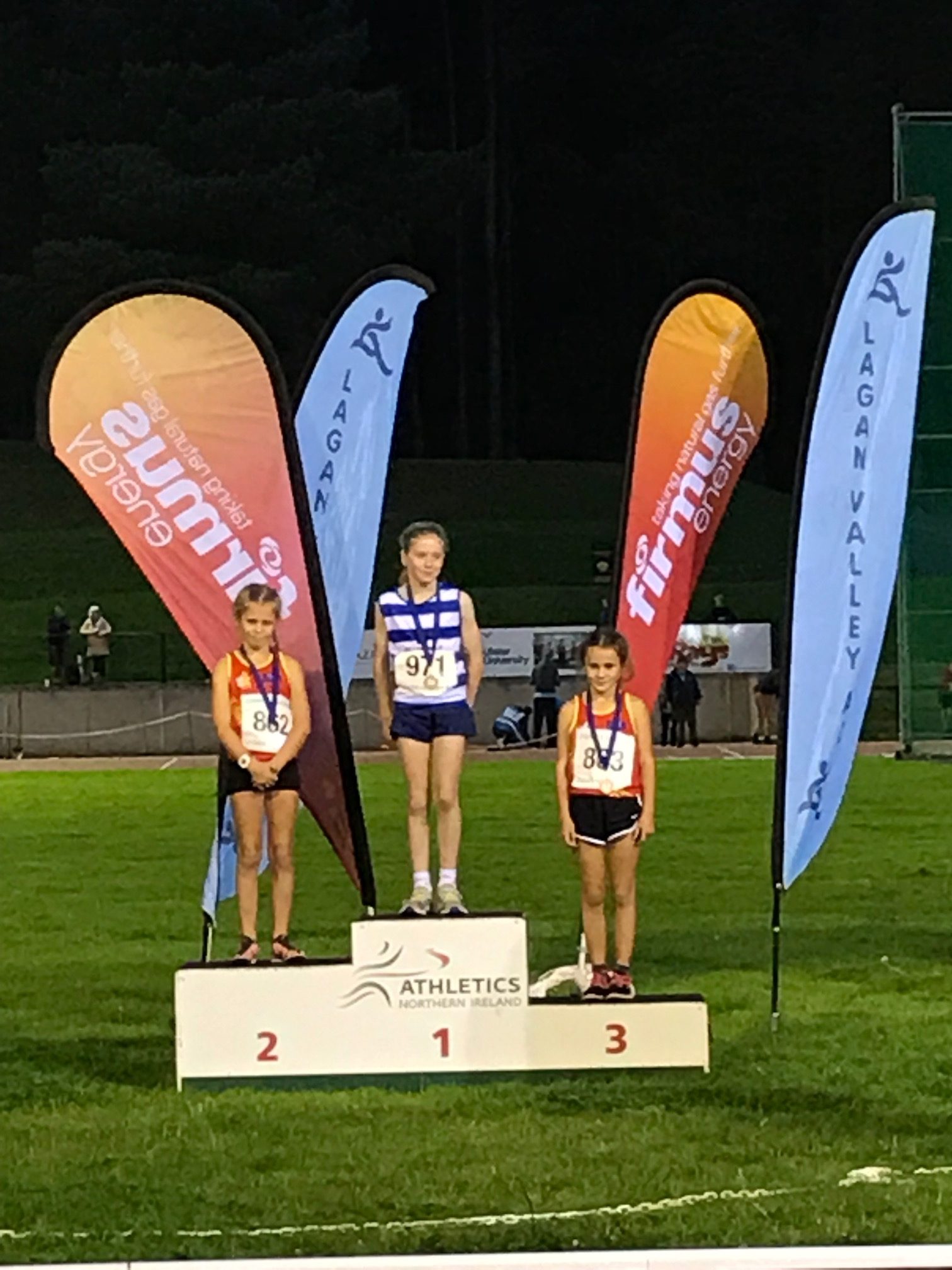 Kari (2nd) and Lily Foster (3rd) on the podium with Emer McKee Willowfield in first place. 