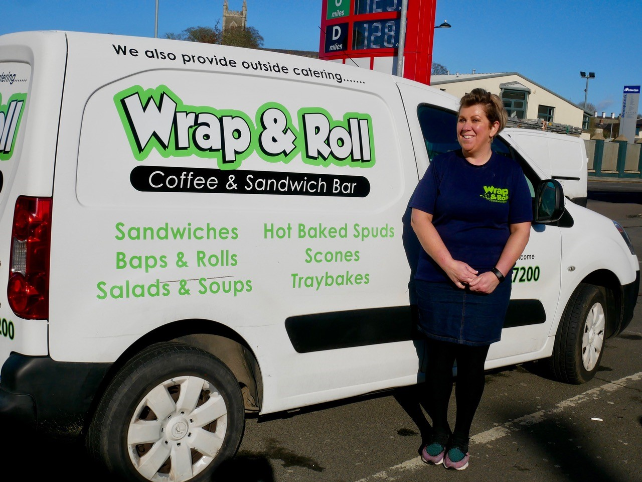 Catherina Kielty of Wrap & Roll filling the van with water for the Jimmy’s 10K race on March 15th